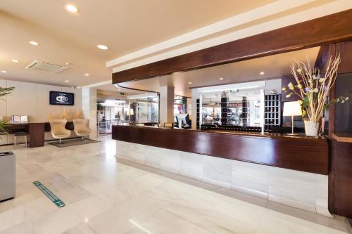 O saguão ou recepção de Hotel Anabel
