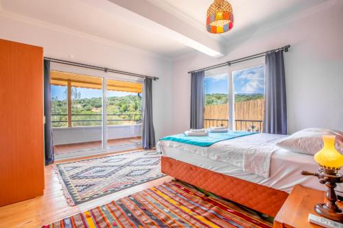 เตียงในห้องที่ Villa Grando 1