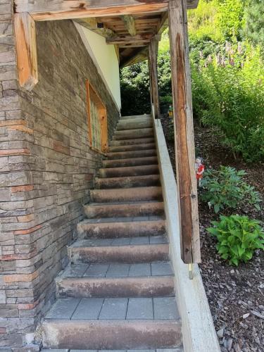 a set of stairs leading up to a building at Apartment Apart Ladner by Interhome in Kappl
