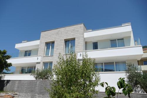 an image of an apartment building at Villa Le Grand Bleu in Đenovići