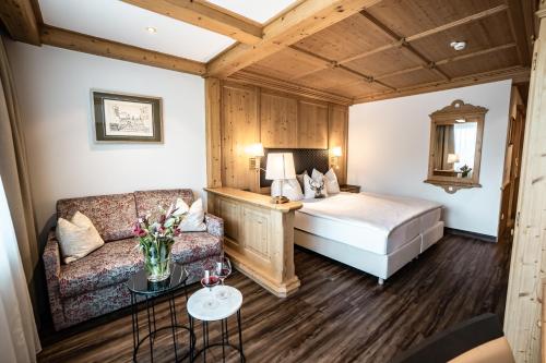 Postel nebo postele na pokoji v ubytování Hotel Hubertushof