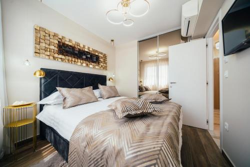 Posteľ alebo postele v izbe v ubytovaní Apartment Rixos Zadar Private Parking Garage