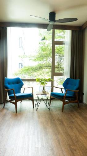 Zona de estar de Tints of Blue Hotel