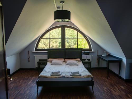 Postel nebo postele na pokoji v ubytování Glass Residence