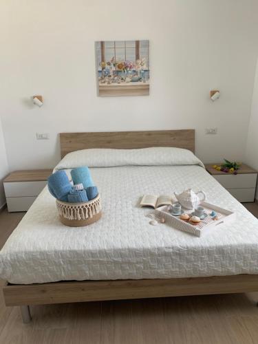 Cama ou camas em um quarto em Appartamenti a 50 m dal mare da Cecimia's Holiday