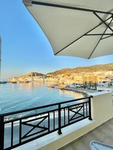 a view of the ocean from a balcony at AQUALIA Apartment 1 in Karpathos Town