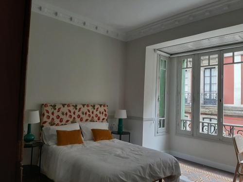 En eller flere senge i et værelse på Bonito piso en Gijon Centro Playa