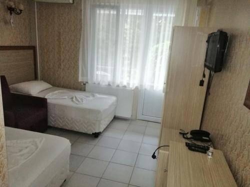 Katil atau katil-katil dalam bilik di Istanbul Yildiz Hotel