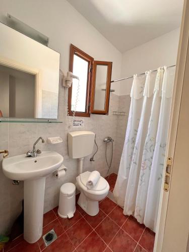 Un baño de Aristomenis Studios