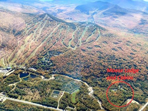 an aerial view of a mountain with a red circle at BC Log cabin with private beach river fire pit AC wifi onsite trails ski slope views in Carroll