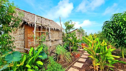 Κήπος έξω από το Việt Mekong Farmstay