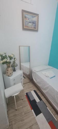 Postel nebo postele na pokoji v ubytování VALENCIA