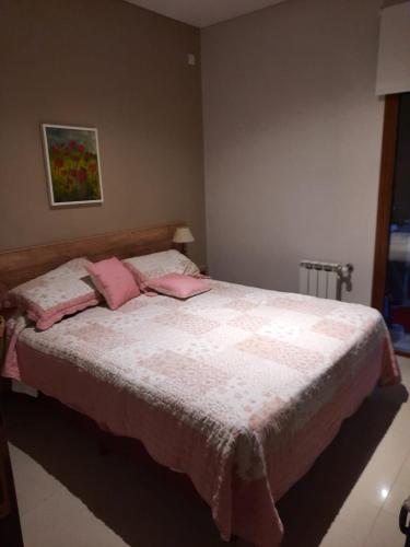 Кровать или кровати в номере Arenas 1