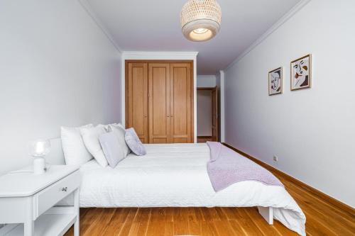 Postel nebo postele na pokoji v ubytování Lovely apartment at the best location in Funchal