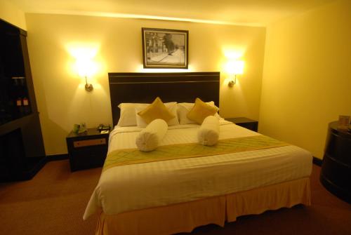 Letto o letti in una camera di Grand Hotel Preanger
