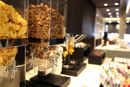 a display of food on a counter in a store at Ego Hotel in Ancona