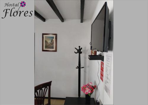TV o dispositivi per l'intrattenimento presso Hostal Flores
