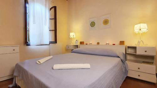 A bed or beds in a room at Mare e Stelle - Θάλασσα και Αστέρια