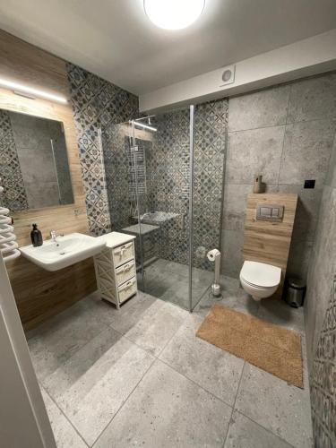 Kúpeľňa v ubytovaní Apartament na Skarpie