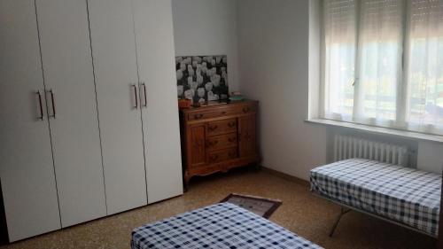 A bed or beds in a room at Relax al mare