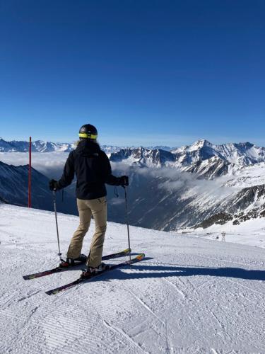 a person on skis in the snow on a mountain at Mallnbach Apartments in Mallnitz