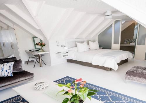 Ένα ή περισσότερα κρεβάτια σε δωμάτιο στο Admiralty Beach House