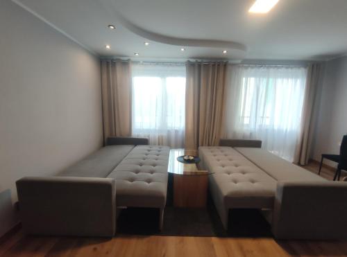 Katil atau katil-katil dalam bilik di Apartament Magnat