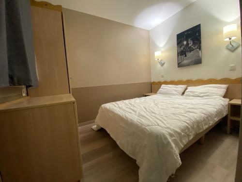 Katil atau katil-katil dalam bilik di Cosy Apartment Disneyland'Val d'Europe'Paris