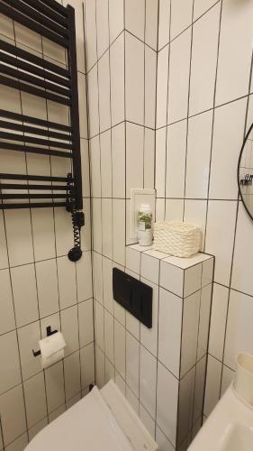 Kúpeľňa v ubytovaní Kurkowa Apartment