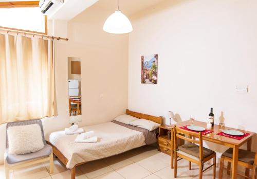 A bed or beds in a room at Mat Old Town Apartments A