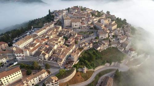 an aerial view of a village on a mountain at Hotel Brufa in Monteleone di Spoleto