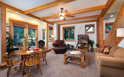 a living room with a couch and a table at Adventures From Bozeman's Perfect Location in Bozeman