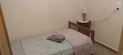 Postel nebo postele na pokoji v ubytování Maison du Bonheur