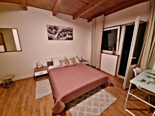Postel nebo postele na pokoji v ubytování Apartman Delnice Park Srna