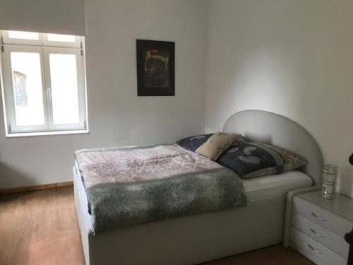 Ένα ή περισσότερα κρεβάτια σε δωμάτιο στο Rathsacks Familienhof