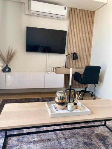 TV o dispositivi per l'intrattenimento presso Executive Apartment at Ellipse Waterfall