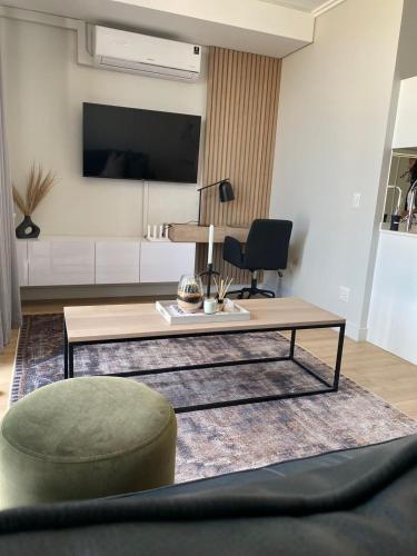 TV o dispositivi per l'intrattenimento presso Executive Apartment at Ellipse Waterfall