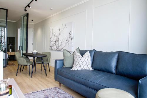 Area soggiorno di Executive Apartment at Ellipse Waterfall