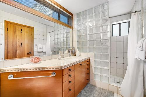 a bathroom with a sink and a mirror at Blue Horizon in Bodega Bay