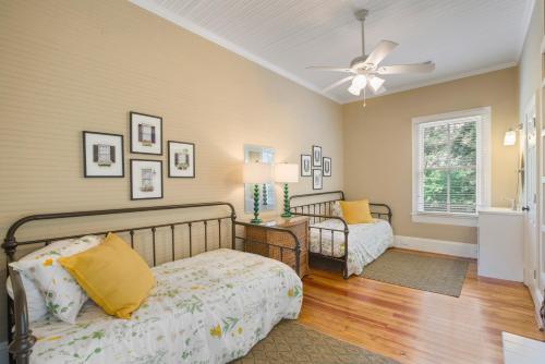 a bedroom with a bed and a ceiling fan at Liberty Hall Bed and Breakfast in Pendleton