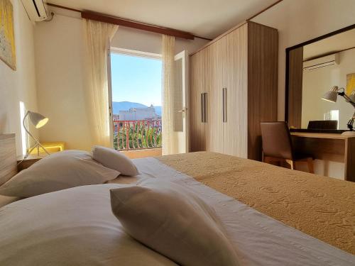 Posteľ alebo postele v izbe v ubytovaní Apartments and rooms by the sea Vrboska (Hvar) - 540