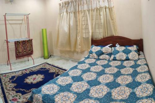 Кровать или кровати в номере Mai KKB Homestay in Kuala Kubu Bharu Taman Juta