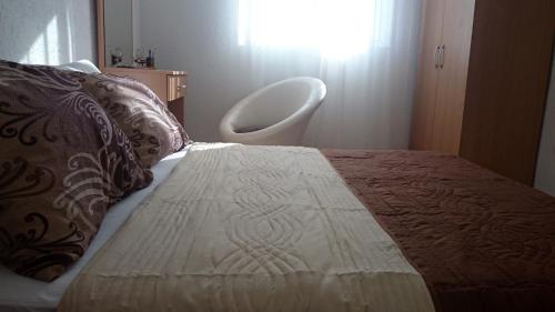 Postel nebo postele na pokoji v ubytování Beni Bungalows