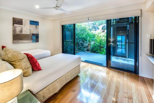 Katil atau katil-katil dalam bilik di Shorelines Apartments on Hamilton Island by HIHA