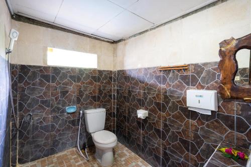 Ένα μπάνιο στο Mushroom Beach Bungalows