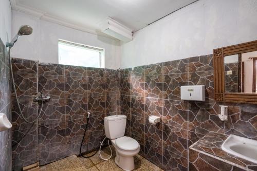 Ένα μπάνιο στο Mushroom Beach Bungalows
