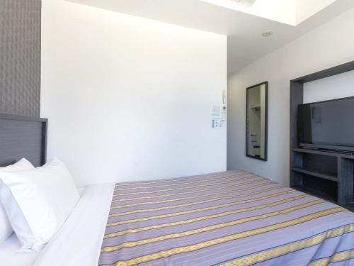 Katil atau katil-katil dalam bilik di Hotel Koza