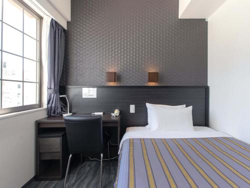 Katil atau katil-katil dalam bilik di Hotel Koza