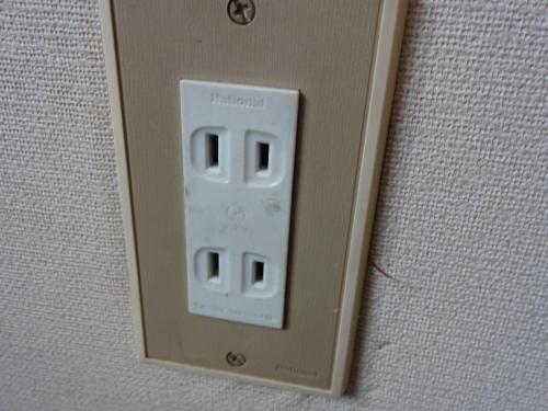 a nintendo wii remote control on a wall at Oomukou Ryokan in Hakuba