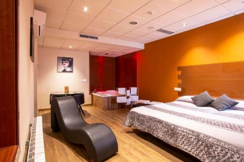 A bed or beds in a room at Motel Los Abedules